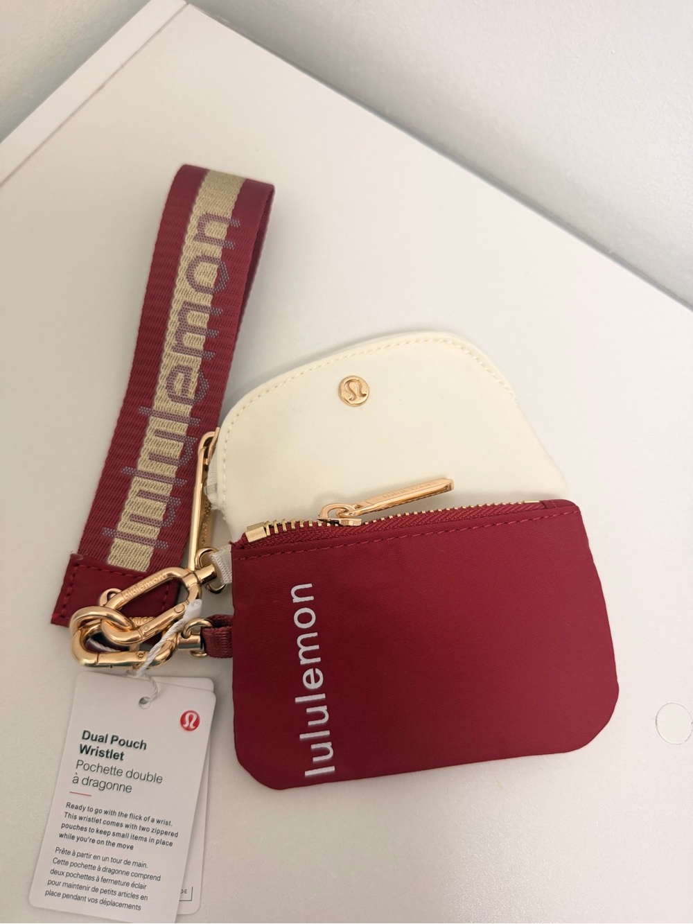 lululemon athletica Dual Pouch Wristlet in Burgundy and Cream with Gold Hardware